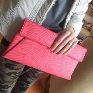 Coral clutch with gold chain strap